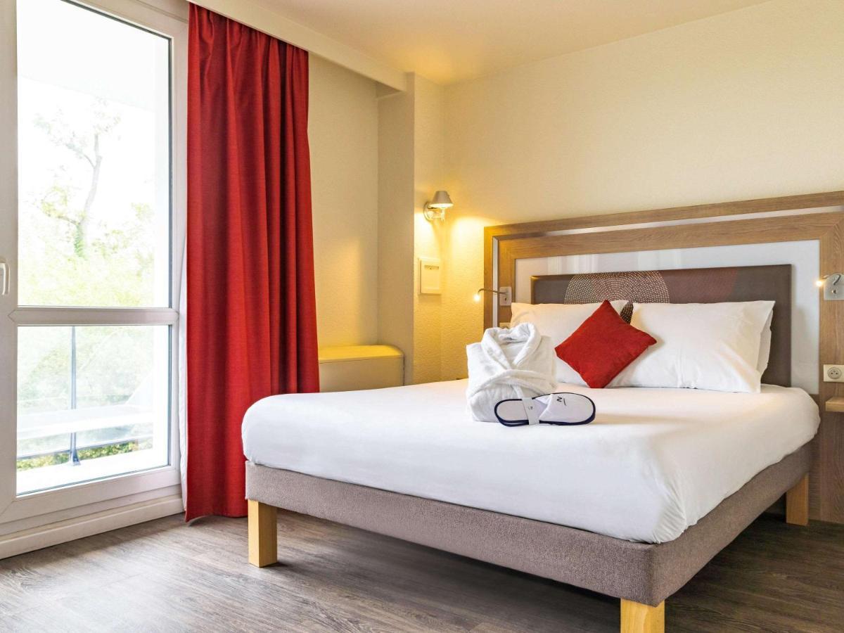 Novotel Senart Golf De Greenparc Saint-Pierre-du-Perray Exterior photo